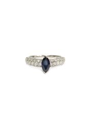 18 Karat White Gold .60 Carat Blue Sapphire and Diamond Ring Type II VS 