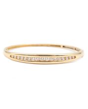 14K yg Hinged Bangle with 17 diamonds 0.82cts tcw